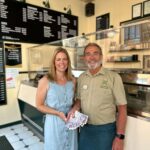 Fundraising On National Fish & Chip Day 2023 For Local Charity - Paul Hay, owner of Fish ’n’ Fritz with Emily McCarron, Co-Founder & Chief Executive Officer of The Bus Shelter Dorset